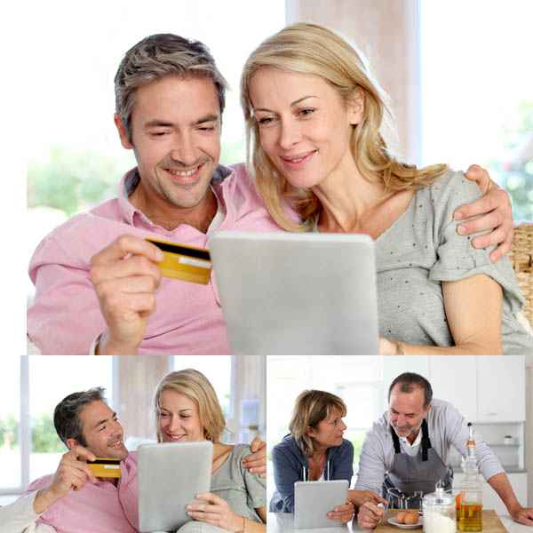 Stock Photo: Couple listening to music at home with tablet